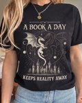 Bookish Merch | A Book A Day Keep Reality Away Comfort T-Shirt